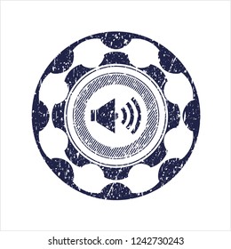 Blue sound icon inside rubber grunge texture stamp