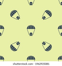 Blue Space capsule returning to earth via parachute icon isolated seamless pattern on yellow background.  Vector Illustration