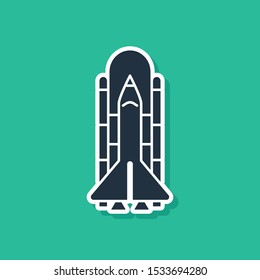 Blue Space shuttle and rockets icon isolated on green background.  Vector Illustration