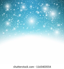 Blue sparkling background with snowflakes