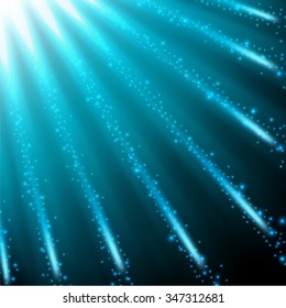 Blue sparkling falling from the sky background