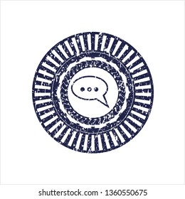Blue speech bubble icon inside grunge stamp