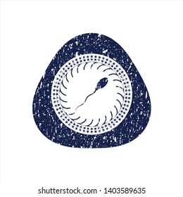 Blue sperm icon inside distressed with rubber seal texture