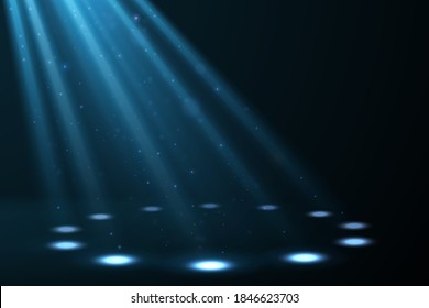 Blue spot lights background with rays