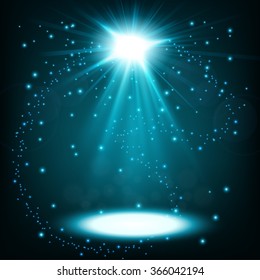 Blue spotlight shining with sprinkles floating