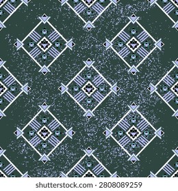 A blue square on a dark green background with a small design of a freestyle shape. An ethnic boho seamless pattern. Tribal pattern. Folk motif. Textile rapport. Wallpapers and tiles. Simple Navajo pattern.