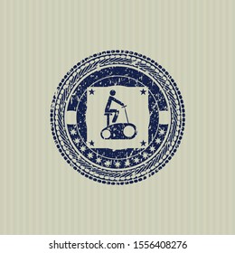 Blue stationary bike icon inside distressed rubber stamp with grunge texture