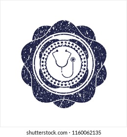Blue stethoscope icon inside rubber grunge seal
