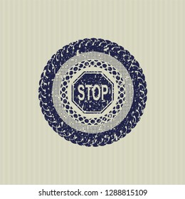Blue stop icon inside distress rubber grunge seal