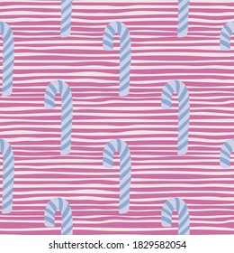 Blue striped christmas lollipos silhouettes seamless pattern. Holiday treats ornament on pink striped background. For fabric design, textile print, wrapping, cover. Vector illustration.