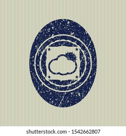 Blue sun behind cloud icon inside rubber grunge texture stamp