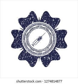 Blue syringe icon inside rubber seal