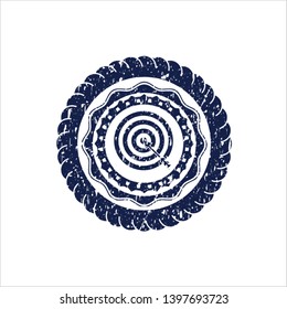 Blue target, business icon inside grunge style stamp
