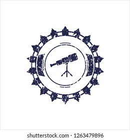 Blue telescope icon inside grunge stamp