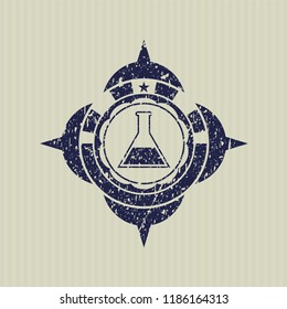 Blue test tube icon inside rubber seal