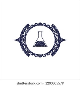 Blue test tube icon inside distressed rubber seal with grunge texture