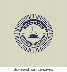 Blue test tube icon inside rubber texture