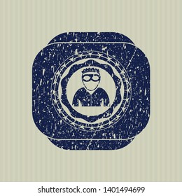 Blue thief icon inside rubber grunge seal