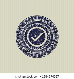 Blue tick icon inside distress rubber seal