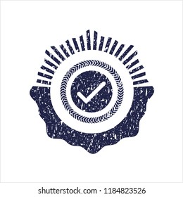 Blue tick icon inside distressed rubber texture