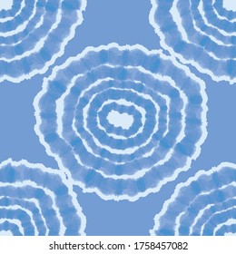 Blue tie dye circles background. Seamless hand painted pattern tie dye shibori print. Textured batik fabric. Vector illustration for fabric, wallpaper, scrapbooking projects, backgrounds. Surface