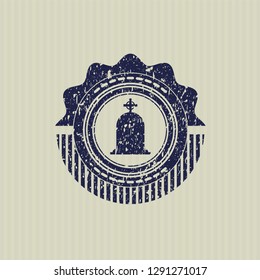 Blue tombstone icon inside distressed rubber grunge stamp