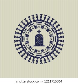 Blue tombstone icon inside rubber seal with grunge texture