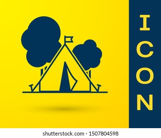 Blue Tourist tent with flag icon isolated on yellow background. Camping symbol.  Vector Illustration