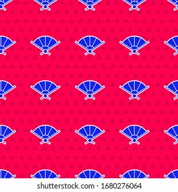 Blue Traditional paper chinese or japanese folding fan icon isolated seamless pattern on red background.  Vector Illustration
