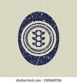 Blue traffic light icon inside distressed rubber texture