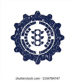 Blue traffic light icon inside distress rubber stamp