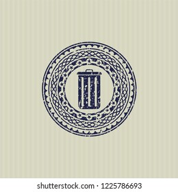 Blue trash can icon inside distressed grunge stamp