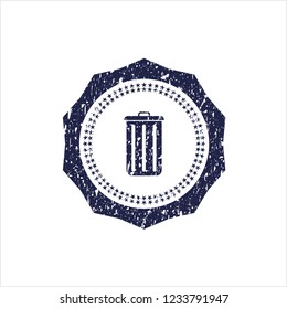 Blue trash can icon inside distress grunge stamp