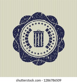 Blue trash can icon inside distress rubber grunge texture stamp