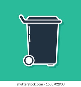 Blue Trash can icon isolated on green background. Garbage bin sign. Recycle basket icon. Office trash icon.  Vector Illustration