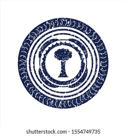 Blue tree icon inside distressed grunge seal
