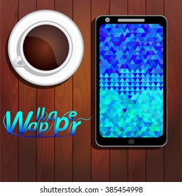 Blue triangles wallpaper on screen of smartphone, cup of coffee, top view