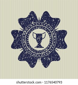 Blue trophy icon inside distressed rubber stamp