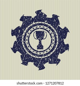 Blue trophy icon inside distressed grunge style stamp