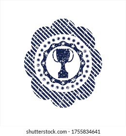 Blue trophy icon inside distressed rubber grunge stamp. 