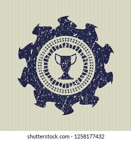 Blue trophy icon inside grunge stamp