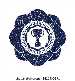 Blue trophy icon inside grunge style stamp
