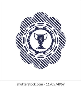 Blue trophy icon inside rubber grunge seal