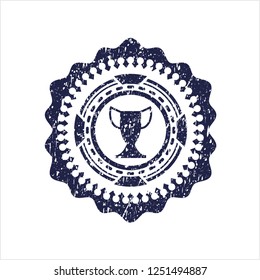 Blue trophy icon inside rubber grunge texture seal