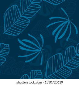 Blue tropical leaves pattern. Tropical seamless pattern with white leaves of monstera, banana and palm trees on a blue background.