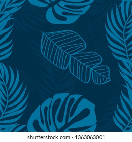 Blue tropical leaves pattern. Tropical seamless pattern with white leaves of monstera, banana and palm trees on a blue background.