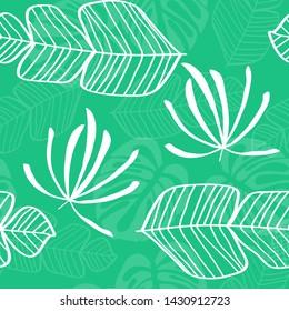 Blue tropical leaves pattern. Tropical seamless pattern with white leaves of monstera, banana and palm trees on a blue background.
