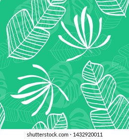 Blue tropical leaves pattern. Tropical seamless pattern with white leaves of monstera, banana and palm trees on a blue background.