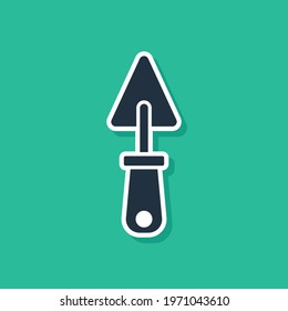 Blue Trowel icon isolated on green background.  Vector