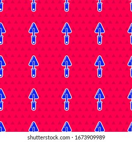 Icono de Blue Trowel aislado sin fisuras en el fondo rojo.  Ilustración vectorial